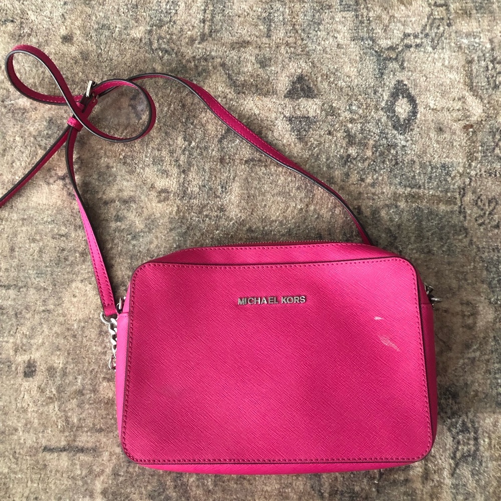 Micheal kors crossbody in hot pink. Gently used, interior is perfect